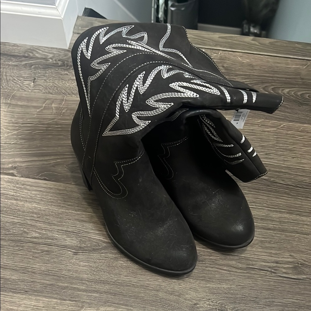 Torrid Black and White Heeled Boots